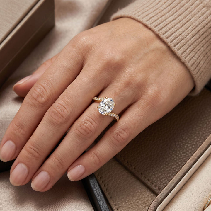 Oval Marquise Side Stone Solitaire Ring