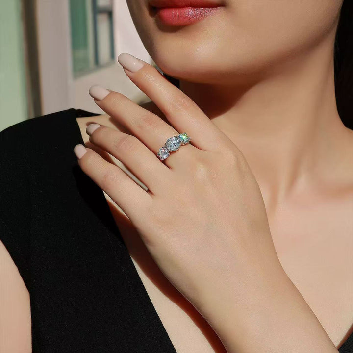 Three-Stone Round Cut Four-Prong Ring