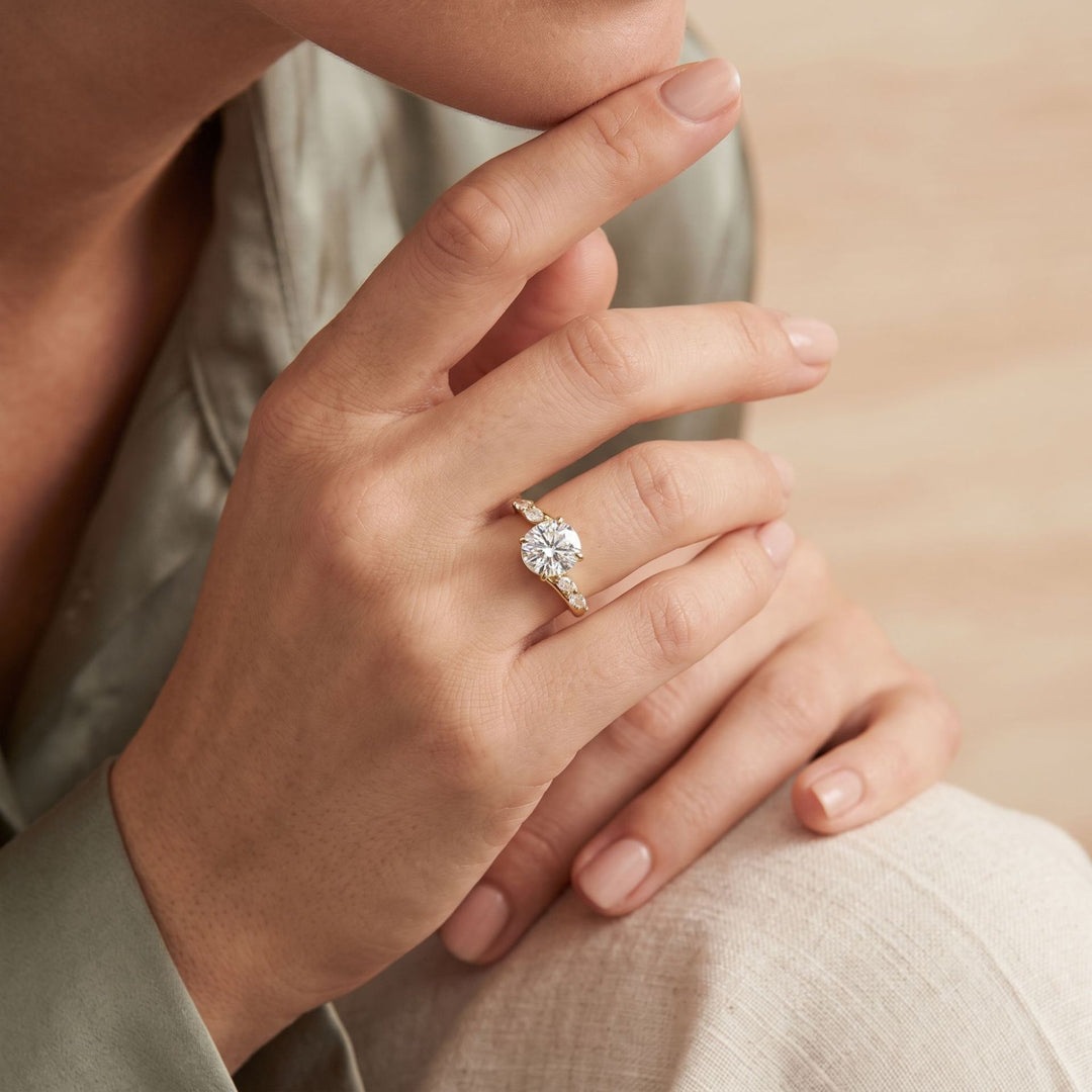 Oval Marquise Side Stone Solitaire Ring