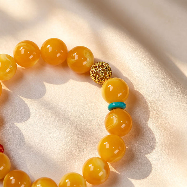 Amber Gourd Tassel Beaded Bracelet