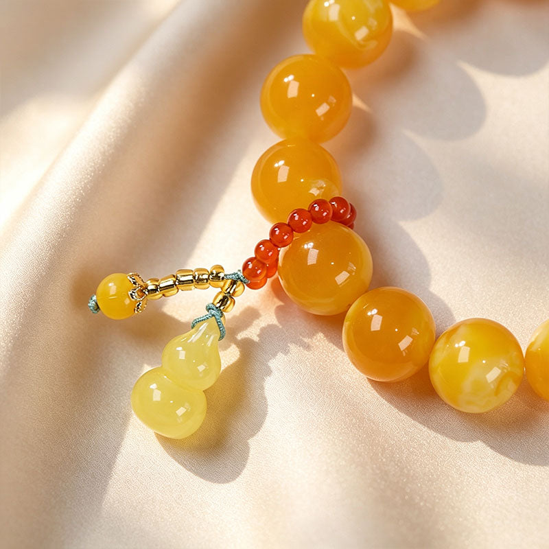 Amber Gourd Tassel Beaded Bracelet