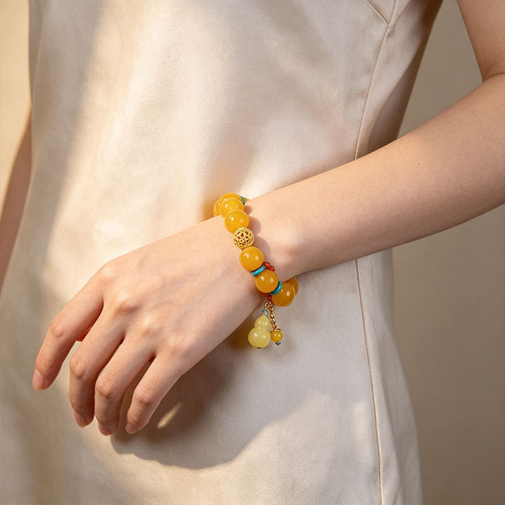 Amber Gourd Tassel Beaded Bracelet