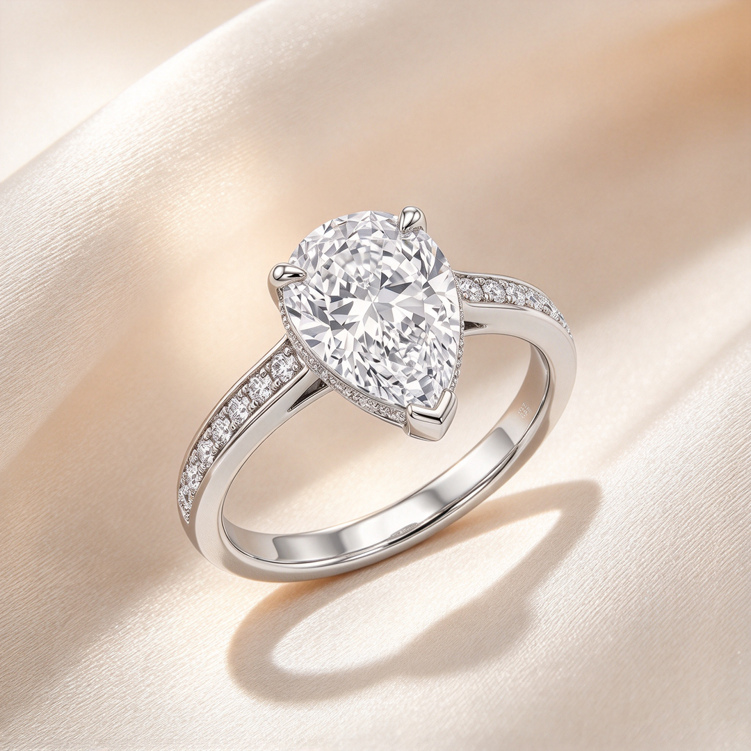 Pear Shape Three-Prong Pavé Band Ring
