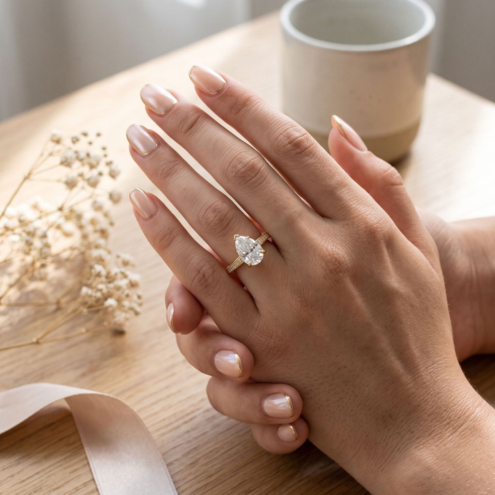 Pear Shape Three-Prong Pavé Band Ring