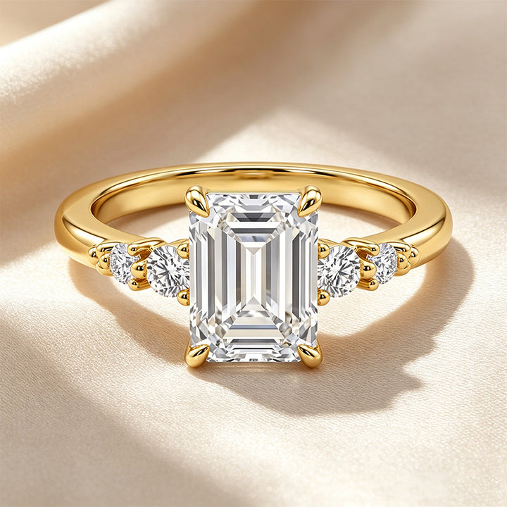 Emerald Cut Side Round Accent Ring