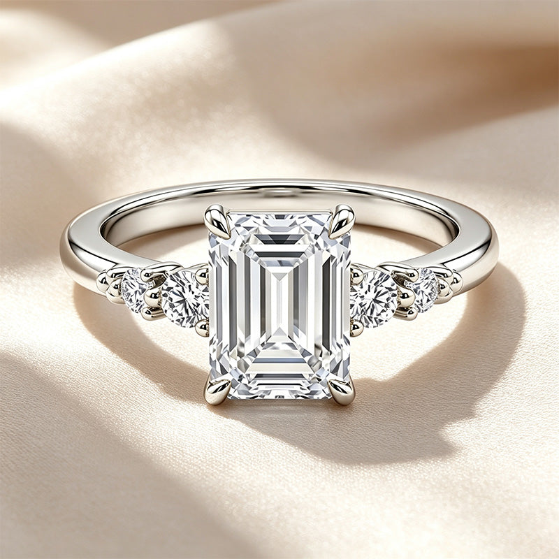Emerald Cut Side Round Accent Ring