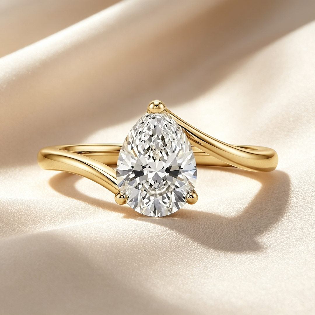 Pear Cut Twist Solitaire Moissanite Ring