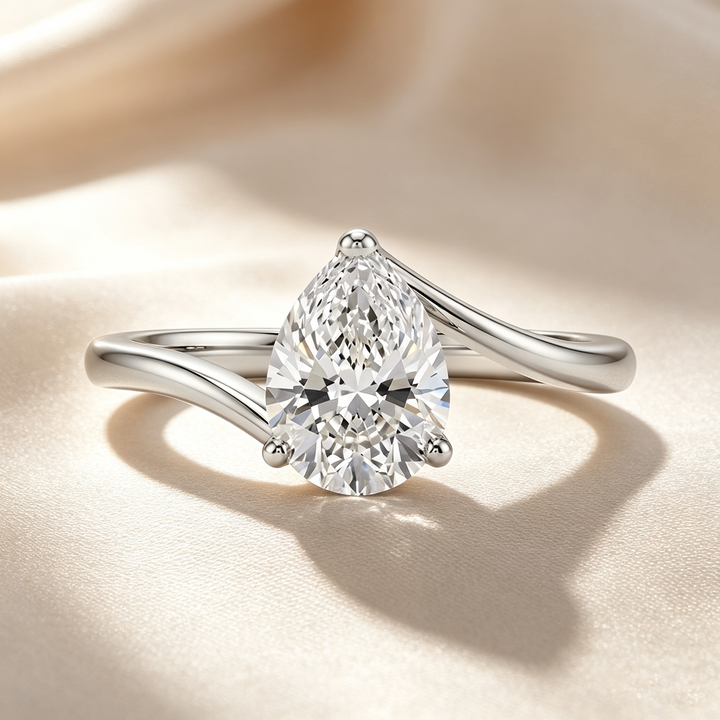 Pear Cut Twist Solitaire Moissanite Ring