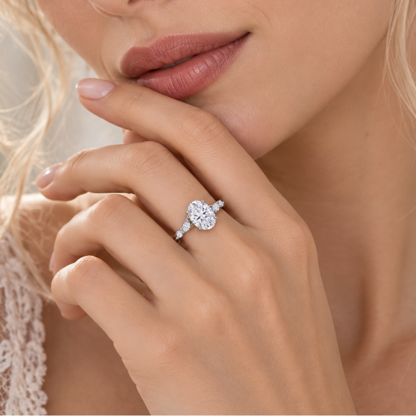 Oval Marquise Side Stone Solitaire Ring