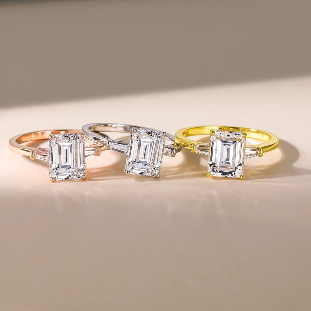 Emerald-cut three-stone ring